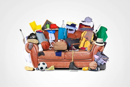 Professional team performing loft clearance in a residential home